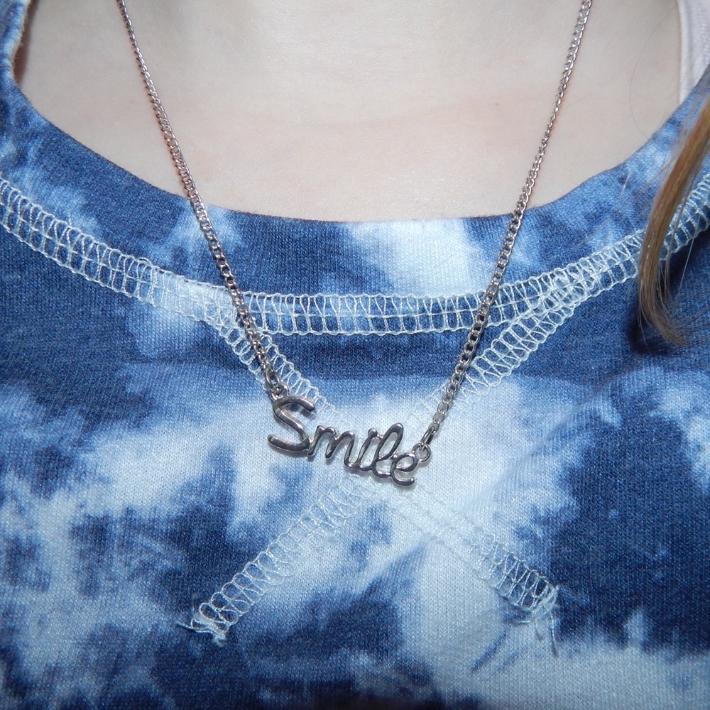 Small cursive “Smile” necklace